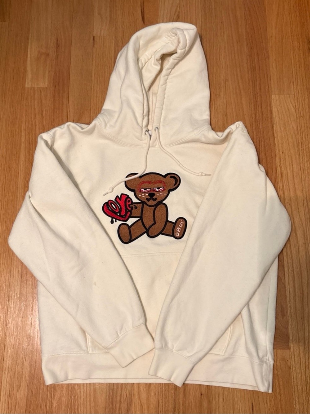 Obey Cream Pullover Hoodie with Bold Logo Tag